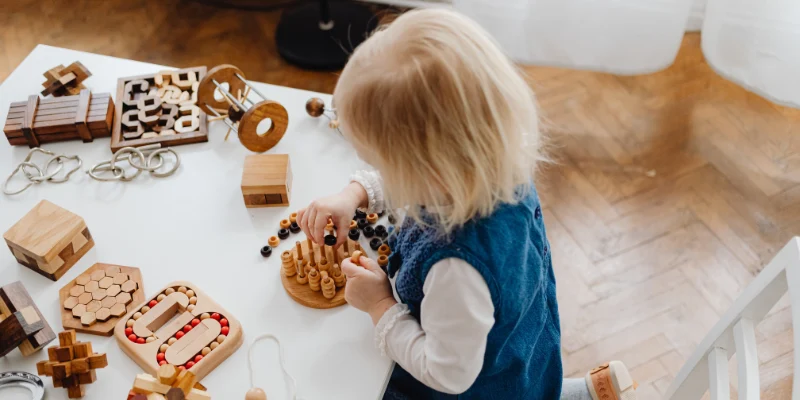 Montessori Childcare in NSW - Young girl guiding her own learning
